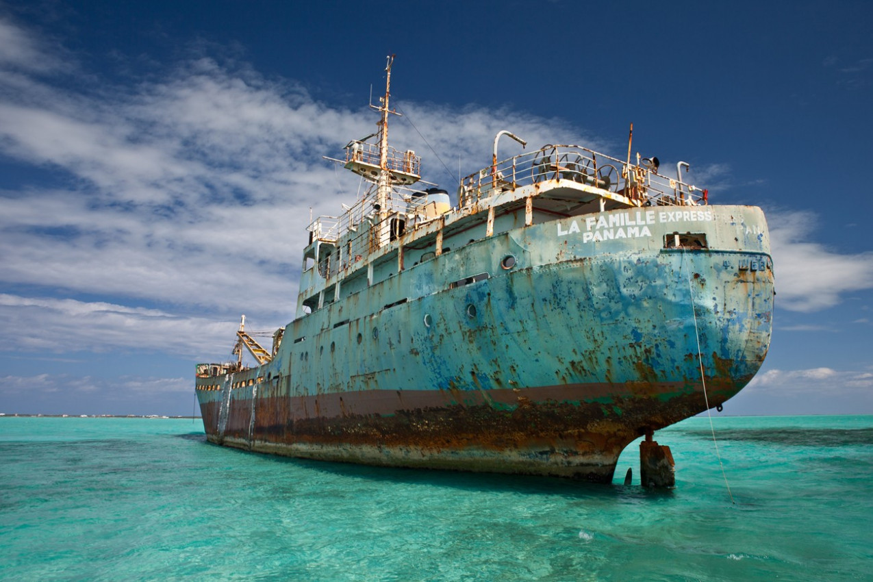 An old cargo ship has run aground in the shallow near the Turks & Caicos Islands